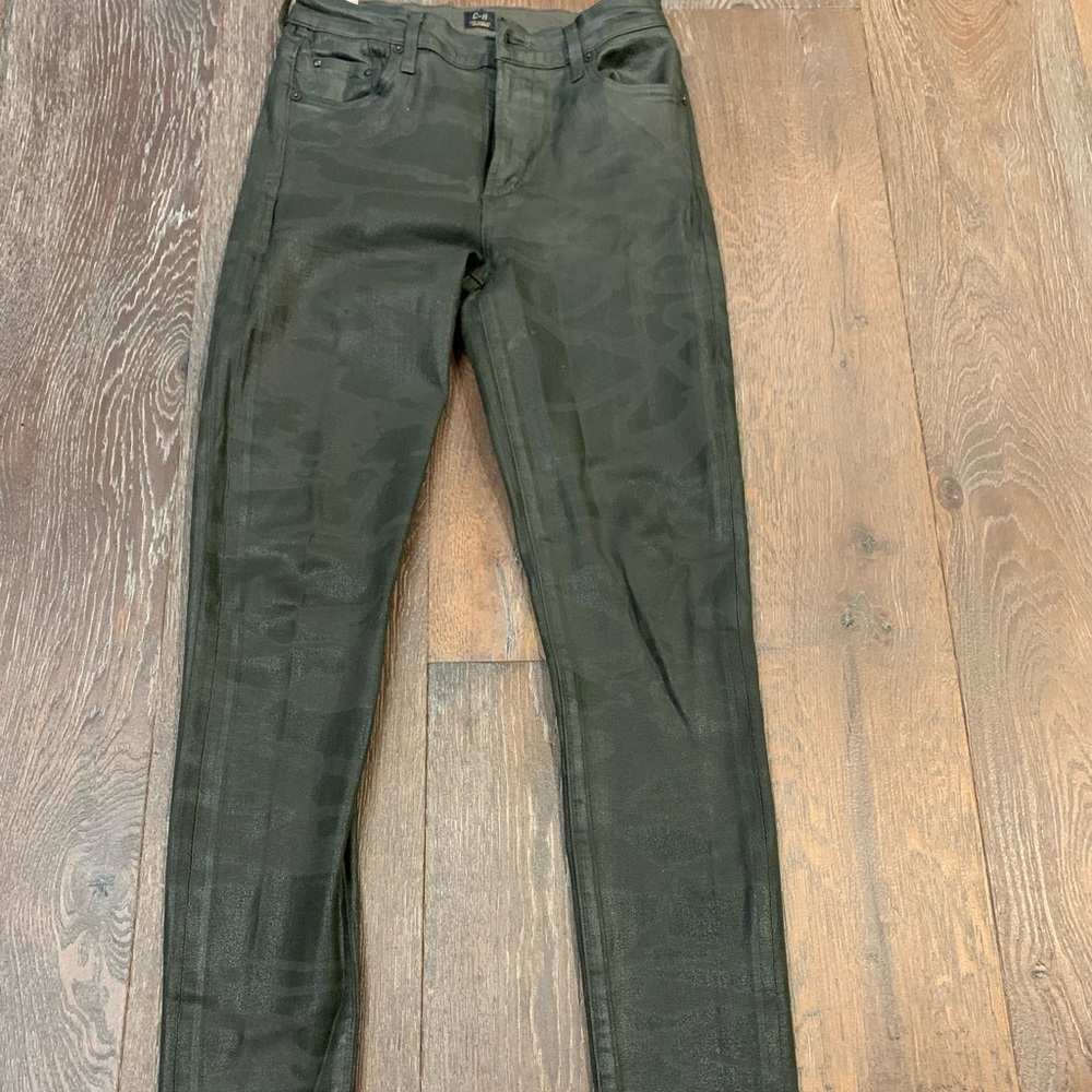 Waxed camouflage jeans